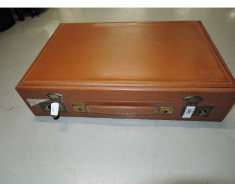 A vintage brown leather biefcase