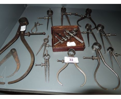 A selection of vintage engineers and architects drawing and measuring items