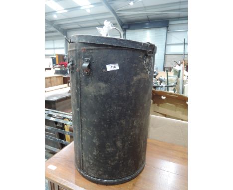 A vintage tin top hat style box