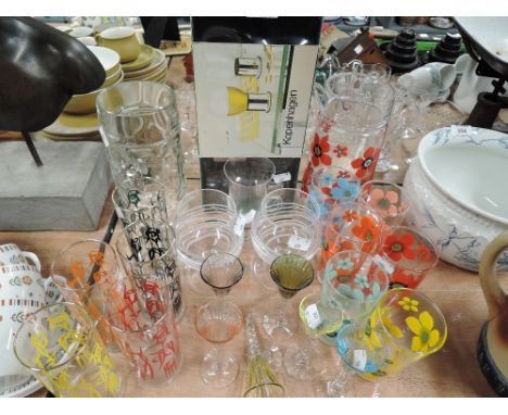 A selection of vintage transfer printed tumblers and similar