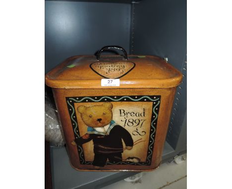 A vintage hand painted biscuit or bread tin