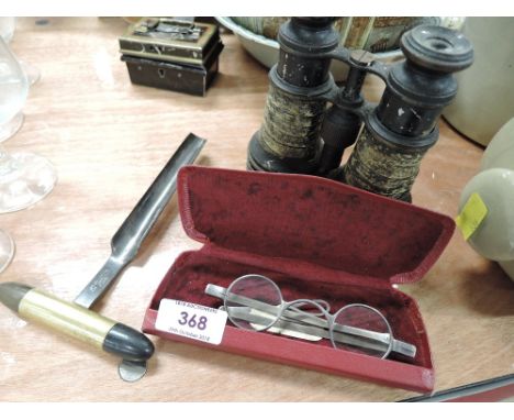 A selection of vintage curios including spectical set and fruit bore 