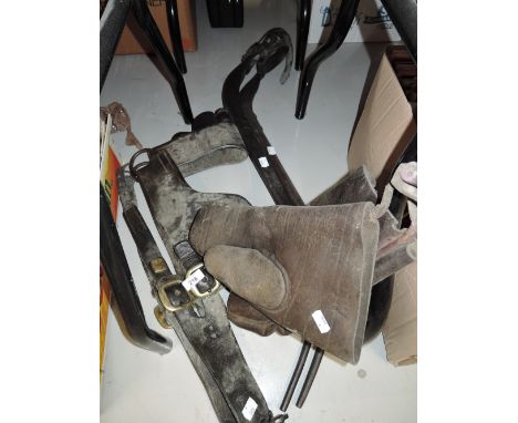 A selection of vintage horse hames and harness etc
