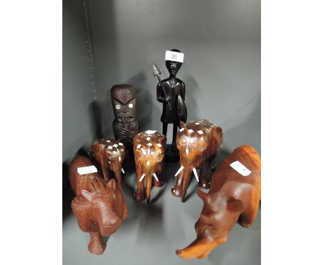 A selection of vintage African styled figures and figurines carved from hard woods
