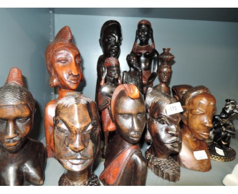 A selection of vintage hand carved hard wood African theme heads 