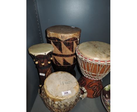 A selection of vintage tribal drums and similar