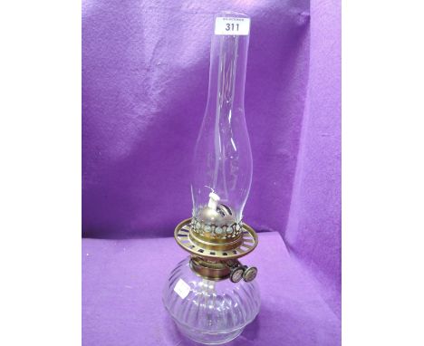 A vintage oil burning lamp by J.Lee Liverpool