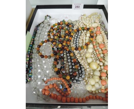 A selection of costume jewellery including bead bangle, branch coral, fresh water and seed pearls etc