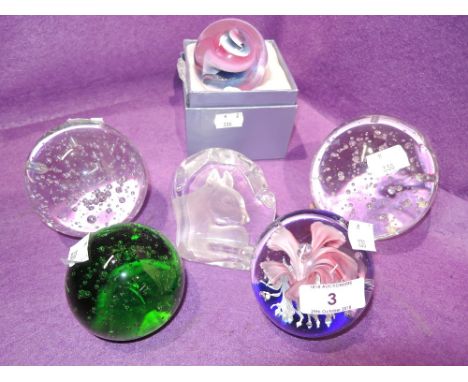 A selection of vintage glass paper weights and dumps 