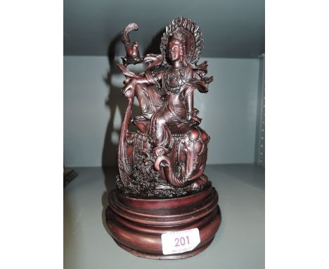A vintage resin cast Indian style deity goddess