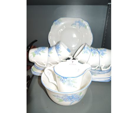 A vintage part tea service by Wellington hand decorated 