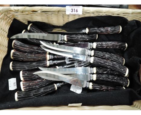A selection of vintage bone effect handle steak knifes 