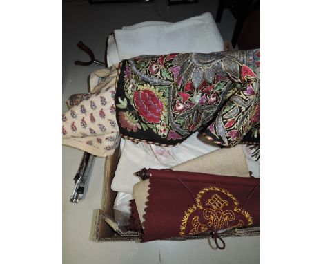 A selection of vintage fabric and needle works 