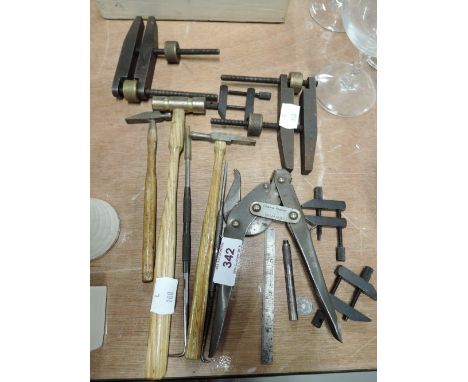 A selection of vintage tinkers tools and similar