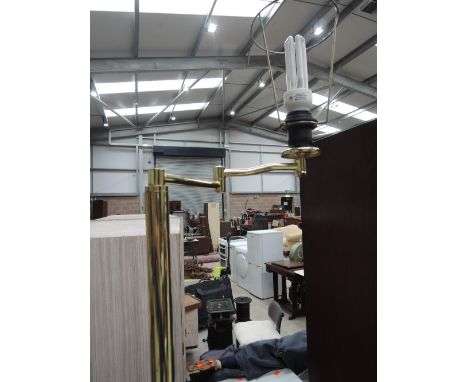 A modern brass standard lamp