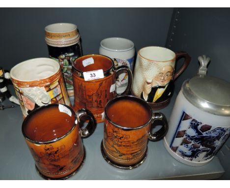 A selection of vintage ceramic tankards and mugs