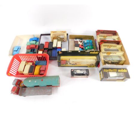 Dinky Corgi and other die cast vehicles, including trucks, cars, a Solido Cadillac, and an animal transport. (qty)