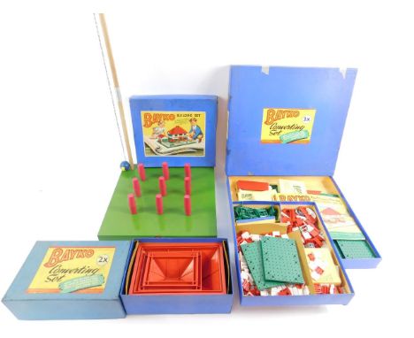 A Bayko building set 3X, converting set 2X, further building set, all boxed, and a Chad Valley table skittles. (4)