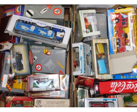 Models of Yesteryear Ertl and other die cast vehicles, including fire appliances, lorries, and vintage trucks, all boxed. (qt