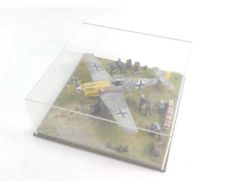 A professional made model diorama of a Messerschmitt 109E, WWII, scale 1:32, perspex cased.
