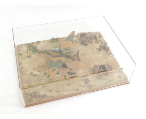 A professional made model diorama of a Junkers JU87 Stuka, in North Africa c1942, scale 1:48, perspex cased.