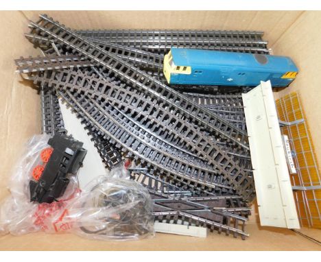 A Hornby Tri-ang 00 gauge diesel locomotive R758, shunting engine, Neukirch Station Platform, and track.