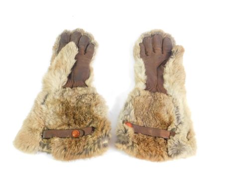 A pair of vintage leather and fur trimmed driving gloves by Dents of Worcester.