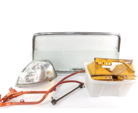 A Renault Master 2003 headlamp, boxed, a rear windscreen, and further motoring accessories. (qty)