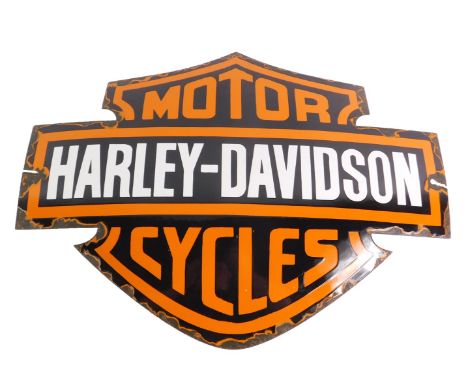 A Harley Davidson Motorcycles black white and orange enamel sign, 53.5cm long.