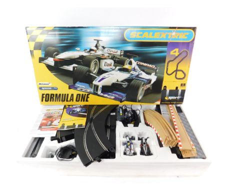 A Scalextric Formula 1 set Mclaren Mercedes MP4-16/4, and Williams F1 BMW FW23/No 5, boxed.