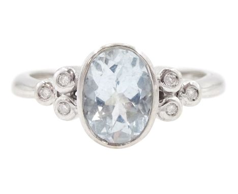 9ct white gold oval aquamarine and round brilliant cut diamond ring, hallmarkedCondition Report:Approx 2.4gm, size N
