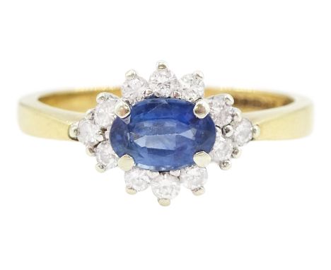 9ct gold oval sapphire and round brilliant cut diamond cluster ring, hallmarked London 1994, sapphire approx 0.55 carat, tota