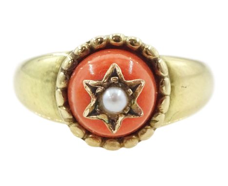 19th century gold coral ring, with applied star and seed pearl decorationCondition Report:Approx 3.9gm, size M, tested approx