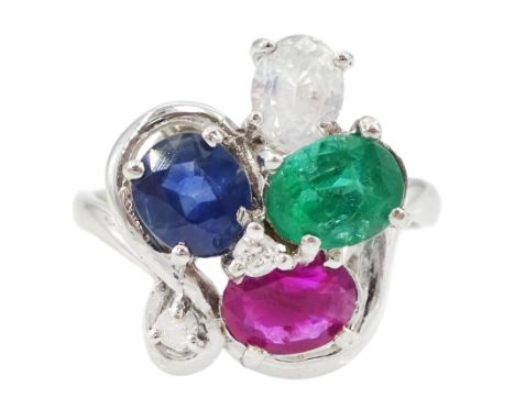18ct white gold two stone diamond and four stone oval cut blue and white sapphire, emerald and ruby ringCondition Report: App