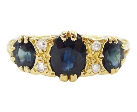 18ct gold three stone oval cut sapphire and four stone round brilliant cut diamond ring, stampedCondition Report:Approx 4.9gm