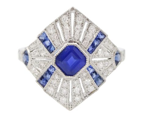 Platinum milgrain set sapphire and diamond openwork design ring, central octagonal cut sapphire, with diamond, calibre cut an
