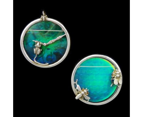 Two Alastair Norman Grant silver and holographic glass brooches, one depicting mice playing on a clock face, the other bees a