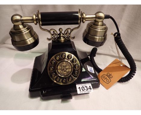 The Duke push button telephone with a black &amp; brass finish and traditional cloth handset curly cord. Compatible with stan