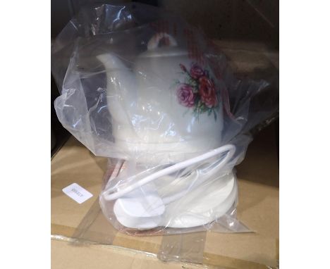 Ceramic floral kettle and a childs boxing set. Not available for in-house P&P, contact Paul O'Hea at Mailboxes on 01925 65913