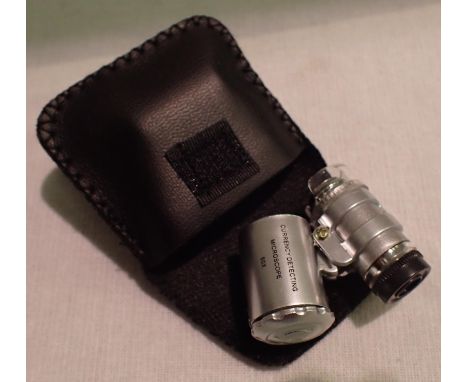 Cased 60x magnification currency/jewellers folding loupe with LED light and instructions. P&amp;P Group 1 (£14+VAT for the fi