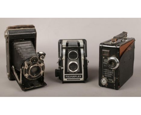 Three vintage cameras; Kodak bellows, Ross Ensign Fulvueflex and a Coronet model B9.5mm cine camera.  
