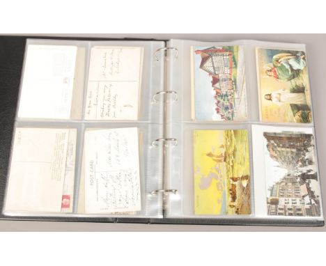 An album of vintage and reproduction postcards including Continental examples.  