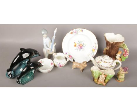 A collection of ceramics to include Sylvac, Poole, Royal Crown Derby, Beswick, Spode etc.  