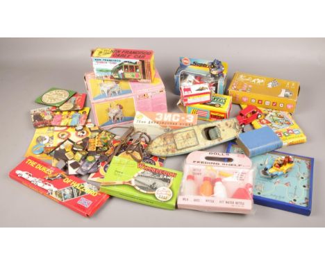 A box of toys, to include vintage examples, Miss Happynak tin plate boat, Sindy, Beatles etc.  