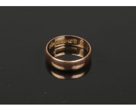 A Victorian 9ct rose gold wedding band. Assayed Birmingham 1897, 1.8 grams, size K 1/2.  