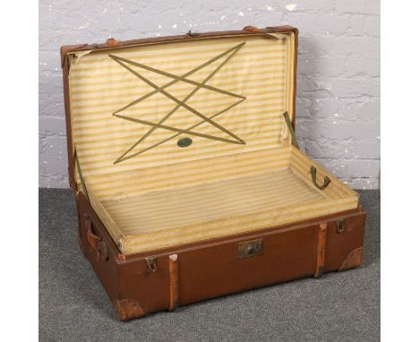 A vintage wood and canvas bound trunk with inner tray. Compressed Fibre Foundation, 87cm wide.  