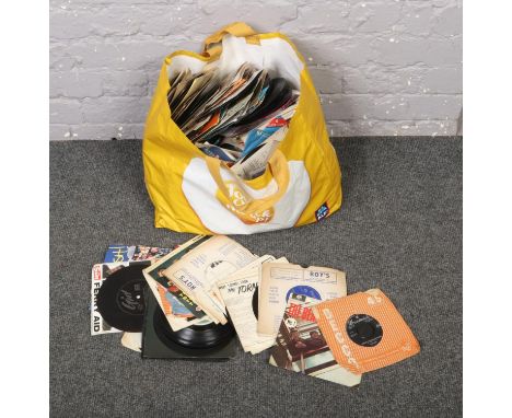 A bag of single records, to include The Beatles, The Who, Shirley Bassey etc.  