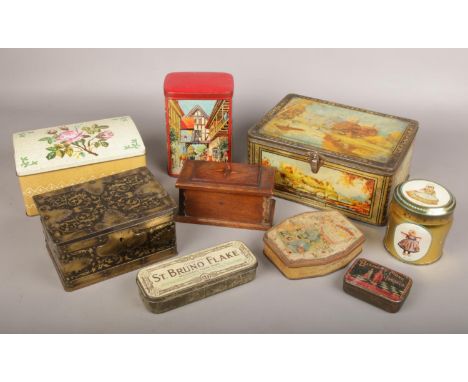A box of vintage tins, to include tobacco and biscuit examples, along with a Victorian wooden box.  