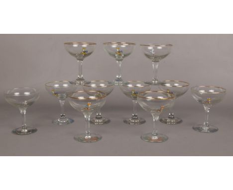 A collection of vintage Babycham glasses, two different styles  
