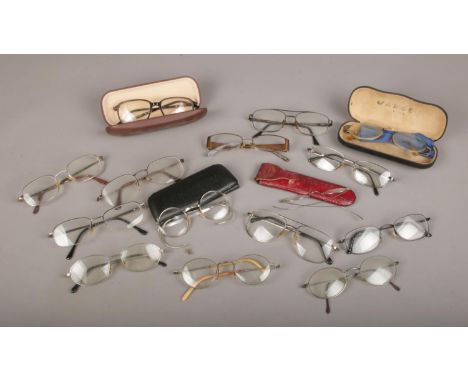 A box of spectacles, to include vintage examples.  
